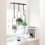 Lifestyle image of Umbra Triflora Hanging Planter