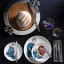 Lifestyle image of Carrol Boyes Spellbinding Side Plates, Set of 4
