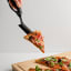 Dreamfarm Scizza Pizza Cutter & Lifter - Black with a slice of pizza
