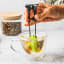 Dreamfarm Teafu Tea Infuser - Green in a cup of tea