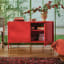Popstrukt Sugar Cube Media Unit - Red Polka with decorative books and vases