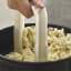 Lifestyle image of Joseph Joseph Easy-Mash Ergonomic Potato Masher