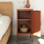 Popstrukt Sugar Cube Side Table - Terra next to the bed