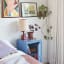 Popstrukt Sugar Cube Side Table - Pigeon Blue next to the bed