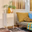 Popstrukt Sugar Cube Side Table - Soft White next to a couch