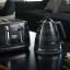 DeLonghi Avvolta Class Cordless Kettle, 1.7L - Black with a toaster on the table