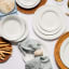 Noritake Arctic White Dinner Set, 16-Piece on the table