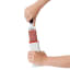 Action image of OXO Good Grips FurLifter Self-Cleaning Garment Brush