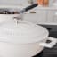 MasterClass Cast Aluminium 4L Shallow Casserole Dish, 28cm - Cream detail on the stove