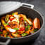 MasterClass Shallow Casserole Dish with Lid, 24cm in use