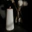 Lifestyle image of Okra Candle Off White Gear-Shaped Candle