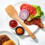 OXO Good Grips Wooden Spatula sitting on a plate
