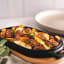 Ooni Cast Iron Sizzler Pan with food