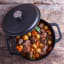 Victoria Matte Black Cast Iron Casserole with Lid, 3.8 Litre in use 