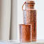 Coppa Wellness Hammered Copper Tumblers, Set of 2 in use 