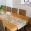 CoralBloom Aristea Natural Hemp Table Runner in use 