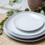 Vista Alegre Karma White Porcelain Dessert Plates, Set of 4 in use 