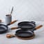 Le Creuset Signature Frying Pan with Wooden Handle, 26cm - Matt Black in use 