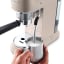 DeLonghi Dedica Metallics Manual Espresso Machine with a milk froth jug