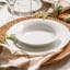 Noritake Arctic White Cereal Bowl on a dinner plate at a table setting