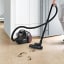 Bosch 2000W Bagless Vacuum in use