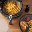 NoStik Reusable Air Fryer Liners, Set of 2 in use 