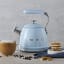 Smeg Whistling Stovetop Kettle - Pastel Blue in use