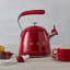 Smeg Whistling Stovetop Kettle - Red in use