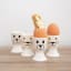 KitchenCraft Cat and Dog Egg Cups, Set of 4 in use