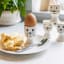 KitchenCraft Cat and Dog Egg Cups, Set of 4 in use