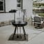 Barebones Cowboy 30 Fire Pit Grill with Adjustable Legs in use