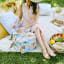 Wildflowers Pretty Picnics Cooler Bag on a picnic blanket outside at a picnic