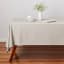 Maxwell & Williams Cotton Classics Rectangular Tablecloth, 3m - Pebble on the table with a dinner set and a flower pot