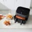 Instant Vortex Plus 8-In-1 Versazone Airfryer, 8.5L with pork ribs and onion rings