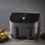 Instant Vortex Plus 8-In-1 Versazone Airfryer, 8.5L next to a roast