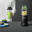 Nutribullet Nutribullet Pro 900W Limited Edition Matte Green High Speed Blender Bundle Set - Matte Black on the table 