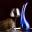 Riedel Cornetto Confetti Decanter, 1.2L - Blue on the table with a glass of wine
