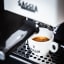Gaggia Classic Pro Espresso Coffee Machine - White detail with a mug