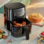 Philips Connected 5000 Series Airfryer with food on the table