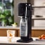 Sodastream Art Sparkling Water Maker - Marble Art with a glass of sparkling water