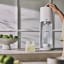 Sodastream Terra Sparkling Water Maker - White pressing the carbonating button