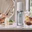 Sodastream Terra Sparkling Water Maker - White with the carbonating bottle and 2 glasses of sparkling water