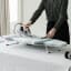 Brabantia Morning Breeze Table Top Ironing Board on the table used to iron clothes