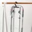 Brabantia Morning Breeze Table Top Ironing Board back view on the hanger