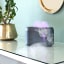 OCO Life Simulated Flame Aroma Diffuser with 2 10ml Oils, 240ml - Black on the table