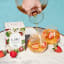 LMC Strawberries & Cream Rooibos Tea with ice on the table