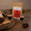 Jimmy Public Odyssey Blend Coffee Beans with two espresso shots and dark chocolate cookies