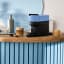 Nespresso Vertuo Pop Coffee Machine - Pacific Blue on t he kitchen counter