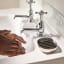 Joseph Joseph EasyStore Luxe Quick Drain Soap Dish with someone washing their hands