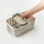 Joseph Joseph EasyStore Medium Bathroom Storage Basket devider being added to basket